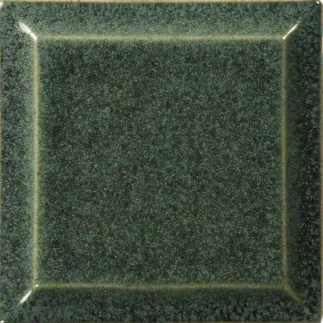 Kominek na drewno Romotop Gremio 5 w kolorze szmaragdowym, widok z boku